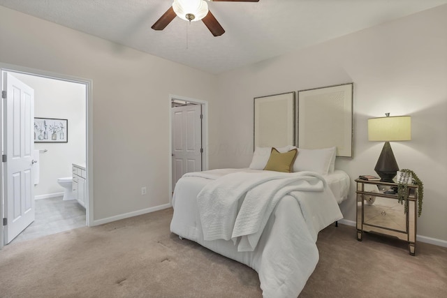 651 Albion Pl, Westerville, OH 43082 - bedroom featuring light colored carpet, baseboards, ensuite bathroom, and ceiling fan