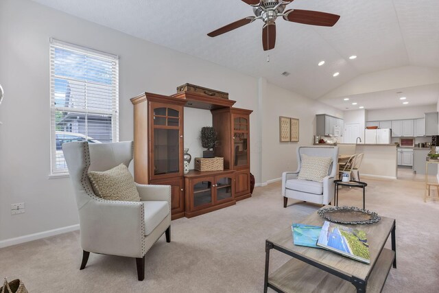 651 Albion Pl, Westerville, OH 43082 - living area with light colored carpet, plenty of natural light, recessed lighting, and vaulted ceiling