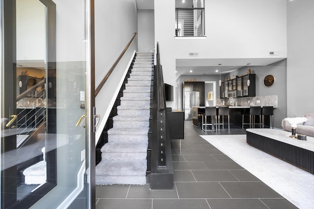 staircase with visible vents