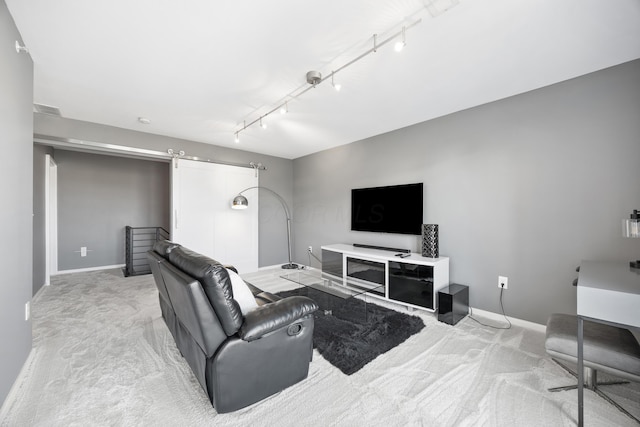 living area featuring baseboards, light colored carpet, rail lighting, and visible vents
