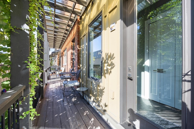 wooden terrace with a porch