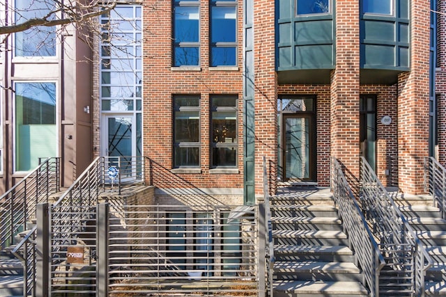 exterior space with brick siding