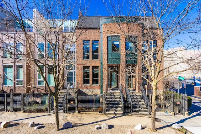 view of front of property with brick siding