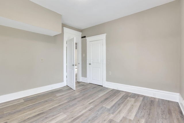 396 E 12th Ave, Columbus, OH 43201 - empty room featuring light wood-style flooring and baseboards