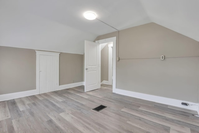 396 E 12th Ave, Columbus, OH 43201 - bonus room featuring lofted ceiling, visible vents, light wood-type flooring, and baseboards