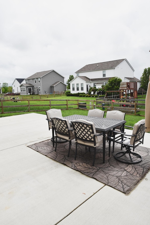 1151 Gelbray Dr, Columbus, OH 43207 - view of patio / terrace with fence and outdoor dining space