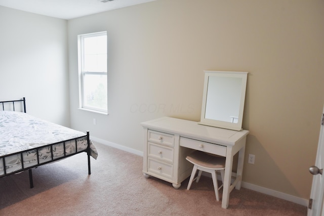 1151 Gelbray Dr, Columbus, OH 43207 - carpeted bedroom featuring baseboards