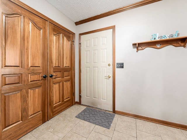 6008 Macnabb Ct, Hilliard, OH 43026 - doorway with crown molding, baseboards, and light tile patterned floors