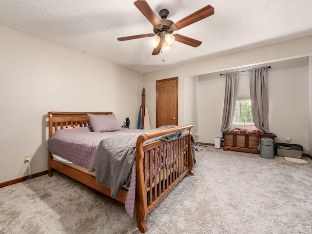 6008 Macnabb Ct, Hilliard, OH 43026 - bedroom featuring carpet floors, a ceiling fan, baseboards, and a textured ceiling