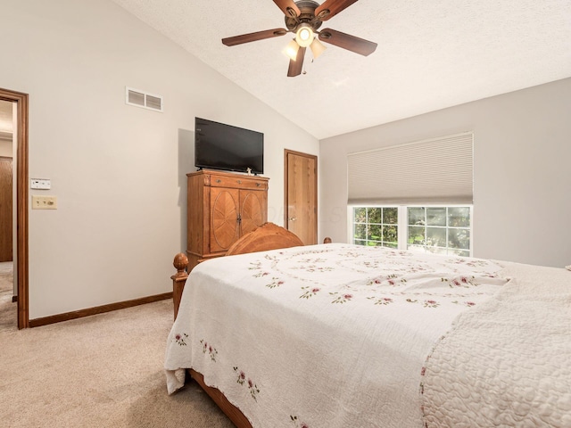 6008 Macnabb Ct, Hilliard, OH 43026 - bedroom with a ceiling fan, light colored carpet, visible vents, vaulted ceiling, and baseboards