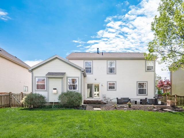 6008 Macnabb Ct, Hilliard, OH 43026 - back of property with fence, central air condition unit, and a yard