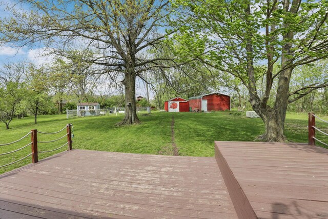 19361 White Stone Rd, Marysville, OH 43040 - deck with an outdoor structure and a yard