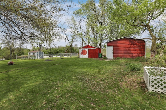 19361 White Stone Rd, Marysville, OH 43040 - view of yard with an outdoor structure, a shed, and fence