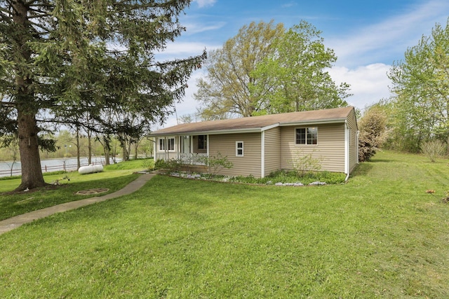 19361 White Stone Rd, Marysville, OH 43040 - single story home featuring a water view, a front lawn, and covered porch