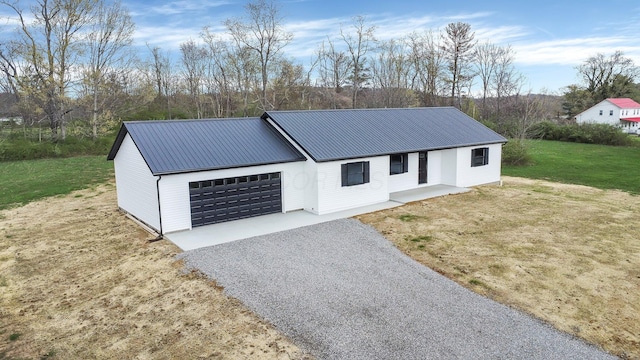 exterior space featuring gravel driveway