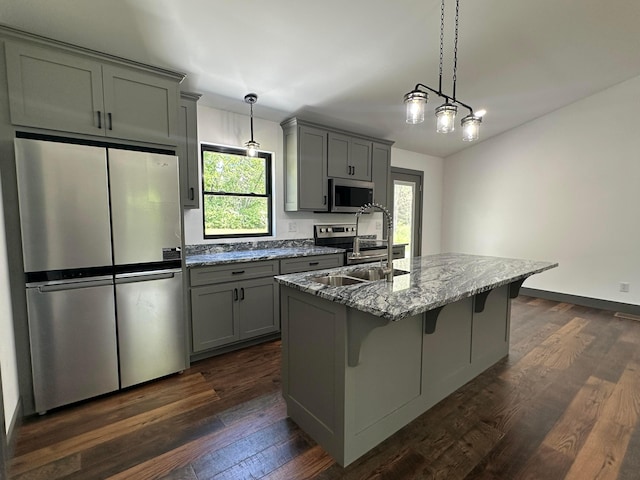 7624 Edria Ln, Athens, OH 45701 - kitchen featuring appliances with stainless steel finishes, gray cabinetry, healthy amount of natural light, and a sink