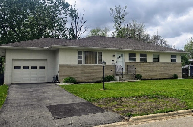 single story home with stucco siding, a garage, a front yard, and stone siding