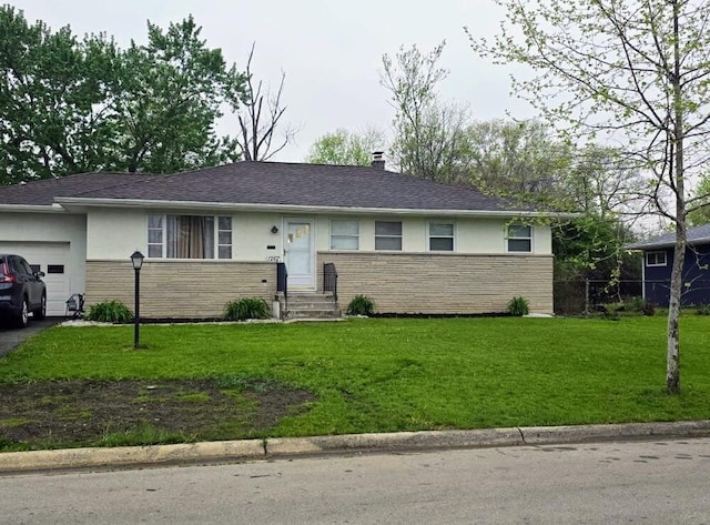 single story home with a front yard, a garage, stone siding, a chimney, and stucco siding