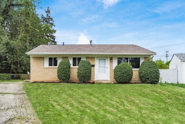 5068 Tremaine Ct, Columbus, OH 43232 - view of front facade with brick siding and a shingled roof