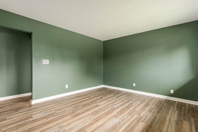 5068 Tremaine Ct, Columbus, OH 43232 - unfurnished room with wood finished floors and baseboards