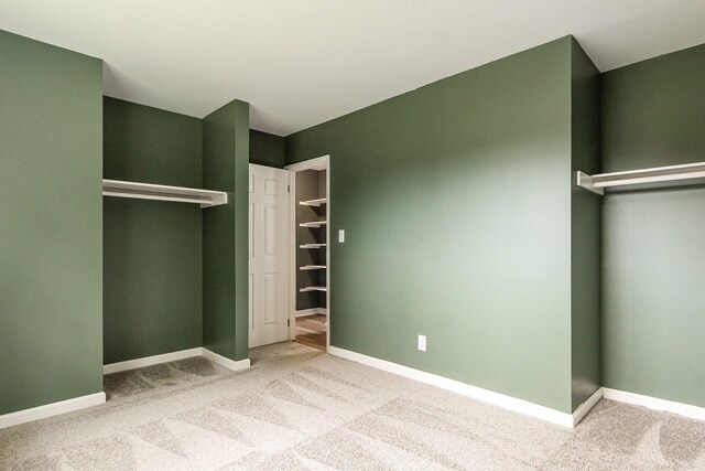 5068 Tremaine Ct, Columbus, OH 43232 - unfurnished bedroom featuring carpet and a closet