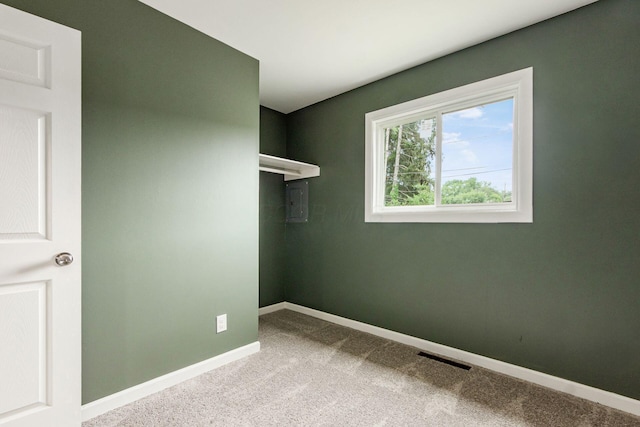 5068 Tremaine Ct, Columbus, OH 43232 - walk in closet featuring carpet flooring and electric panel
