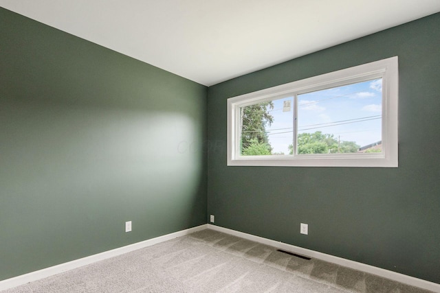 5068 Tremaine Ct, Columbus, OH 43232 - carpeted spare room featuring baseboards