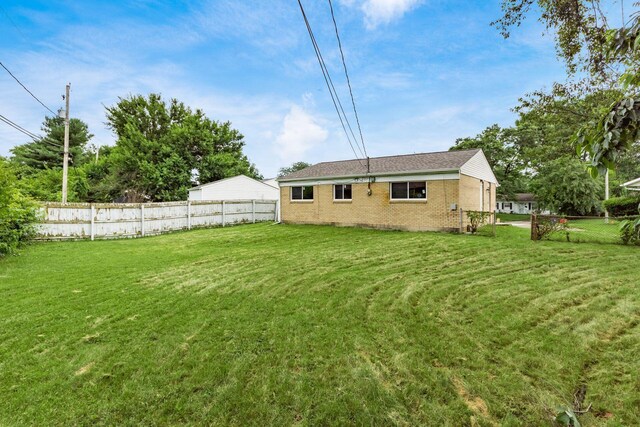 5068 Tremaine Ct, Columbus, OH 43232 - rear view of house featuring brick siding