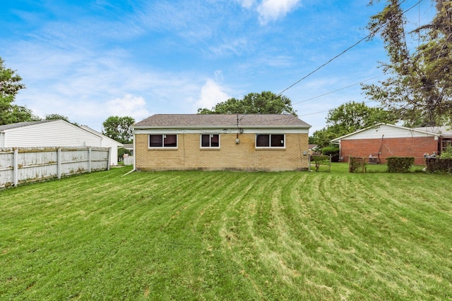 5068 Tremaine Ct, Columbus, OH 43232 - back of house featuring brick siding