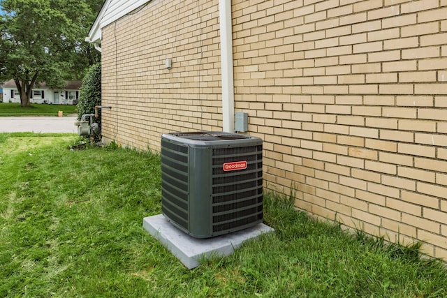 5068 Tremaine Ct, Columbus, OH 43232 - exterior view of a central air condition unit and brick siding