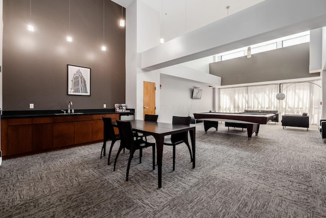 106 N High St Unit 104, Columbus, OH 43215 - game room featuring carpet flooring and a high ceiling