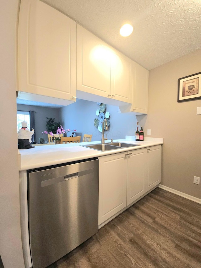 6682 Lagrange Dr Unit 48B, Canal Winchester, OH 43110 - kitchen with stainless steel dishwasher, light countertops, white cabinetry, a sink, and dark wood finished floors
