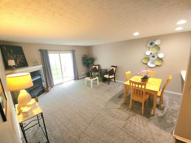 6682 Lagrange Dr Unit 48B, Canal Winchester, OH 43110 - dining room with baseboards, carpet flooring, and a textured ceiling