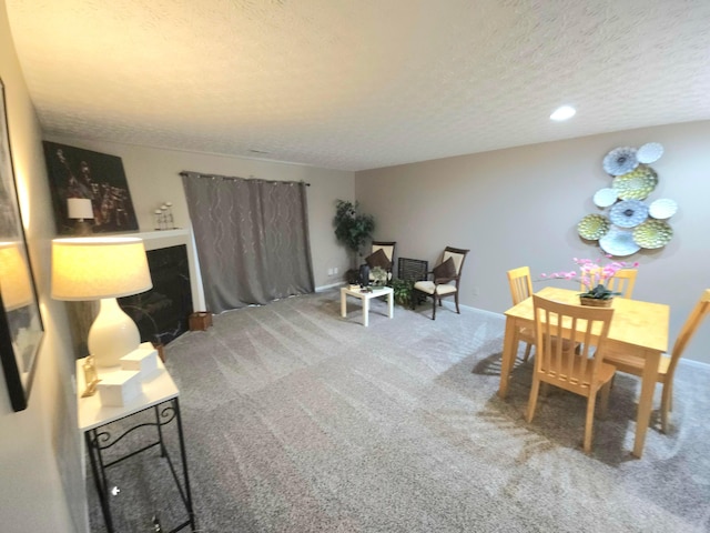 6682 Lagrange Dr Unit 48B, Canal Winchester, OH 43110 - carpeted dining room with baseboards and a textured ceiling