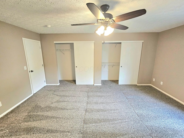 6682 Lagrange Dr Unit 48B, Canal Winchester, OH 43110 - unfurnished bedroom featuring two closets, carpet flooring, ceiling fan, and baseboards