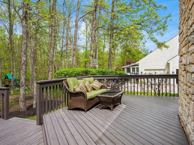 wooden terrace featuring outdoor lounge area
