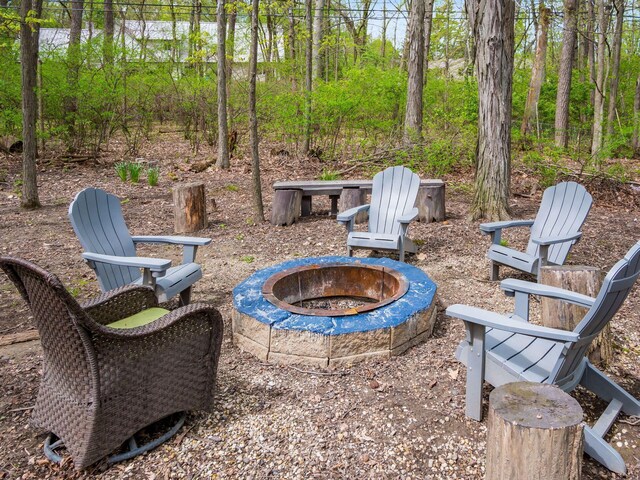 view of patio with a fire pit