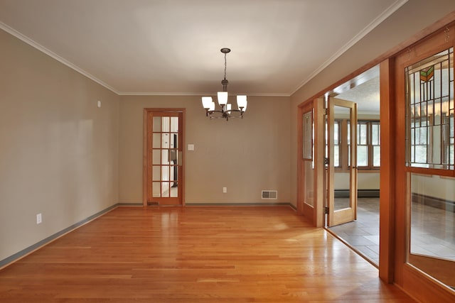 2589 Brookwood Rd, Columbus, OH 43209 - unfurnished dining area featuring light wood-style floors, a chandelier, ornamental molding, and baseboards