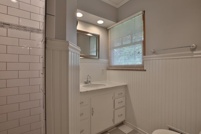 2589 Brookwood Rd, Columbus, OH 43209 - bathroom with wainscoting and vanity