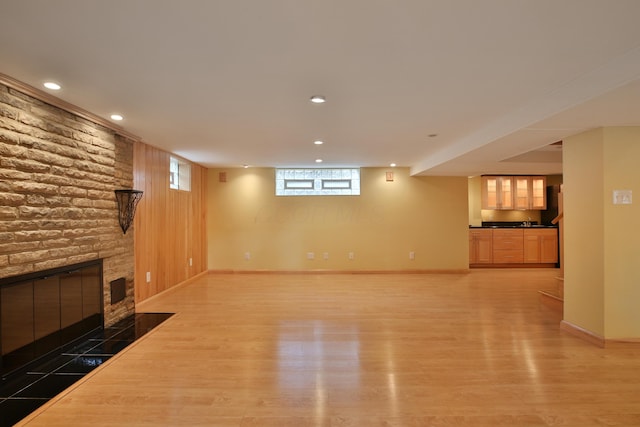 2589 Brookwood Rd, Columbus, OH 43209 - unfurnished living room featuring light wood-style floors, a fireplace, recessed lighting, and baseboards