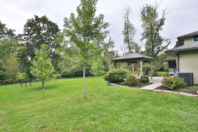2589 Brookwood Rd, Columbus, OH 43209 - view of grassy yard featuring a gazebo and central AC