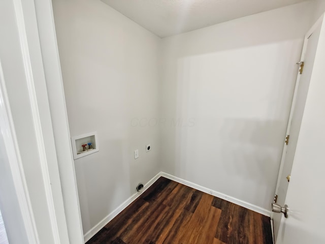 washroom featuring dark wood finished floors, laundry area, hookup for an electric dryer, washer hookup, and baseboards