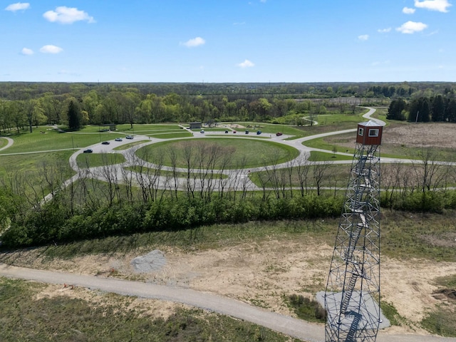view of community featuring a forest view