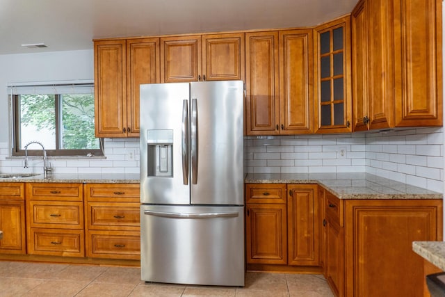 173 S Chesterfield Rd, Columbus, OH 43209 - kitchen featuring stainless steel fridge, a sink, and brown cabinets