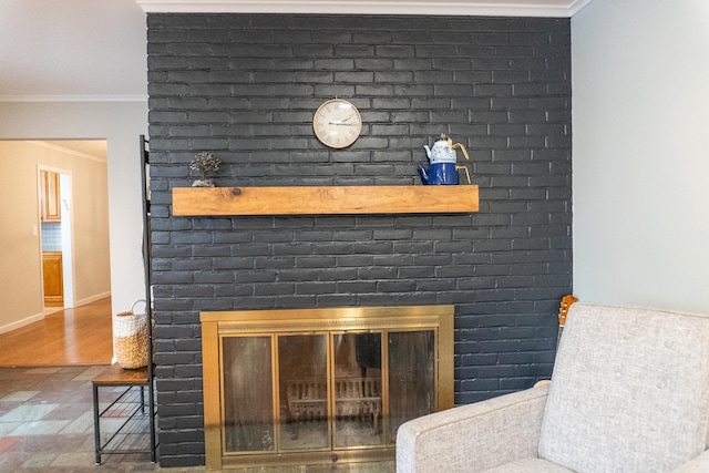 173 S Chesterfield Rd, Columbus, OH 43209 - detailed view of a fireplace, ornamental molding, wood finished floors, and baseboards