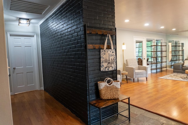 173 S Chesterfield Rd, Columbus, OH 43209 - corridor featuring ornamental molding, wood finished floors, and brick wall
