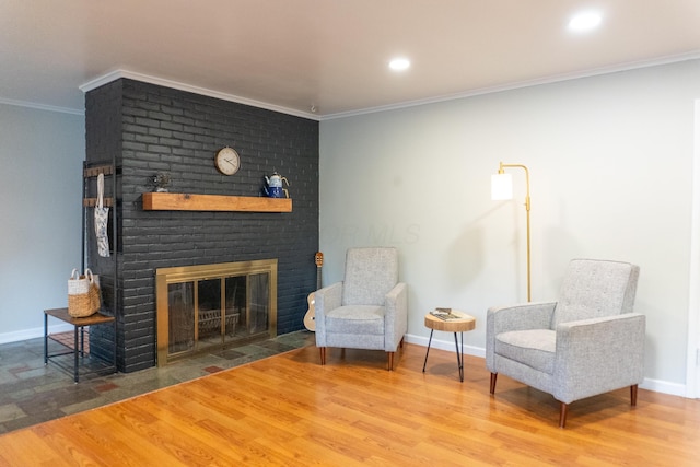 173 S Chesterfield Rd, Columbus, OH 43209 - sitting room featuring wood finished floors, a fireplace, crown molding, baseboards, and recessed lighting