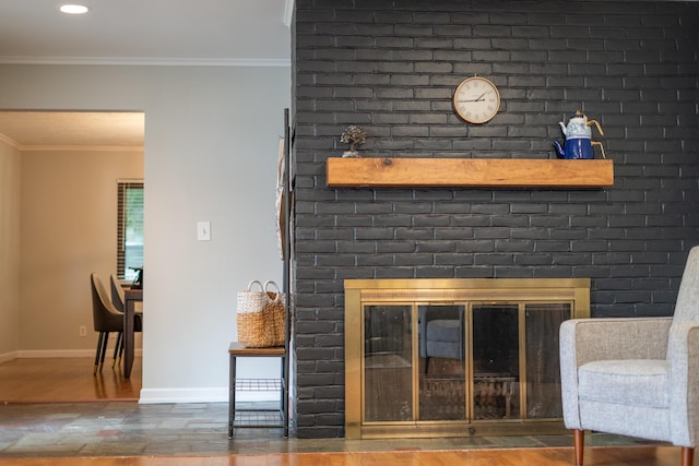 173 S Chesterfield Rd, Columbus, OH 43209 - detailed view of a fireplace, wood finished floors, baseboards, crown molding, and recessed lighting