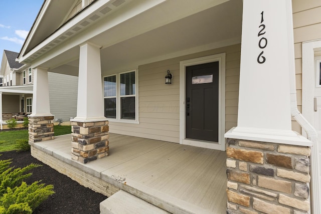 1206 Clover St, Sunbury, OH 43074 - doorway to property with a porch