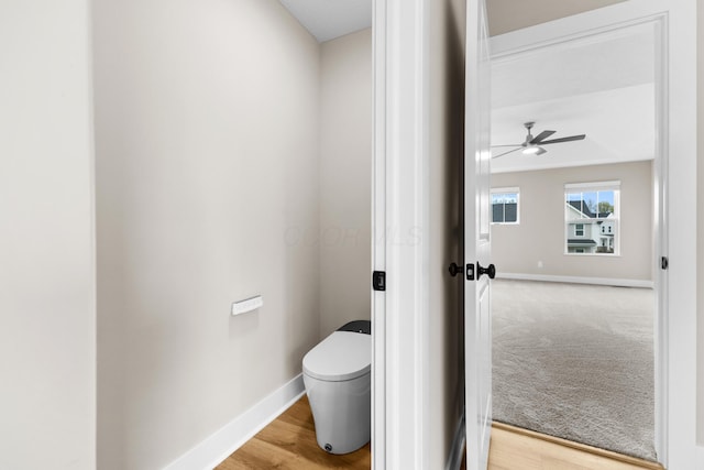 1206 Clover St, Sunbury, OH 43074 - bathroom with baseboards, a ceiling fan, and toilet